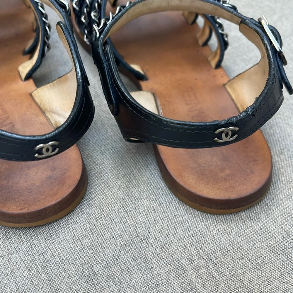 CHANEL Strappy Flat Sandal in Black Leather and Silver Chain Detail